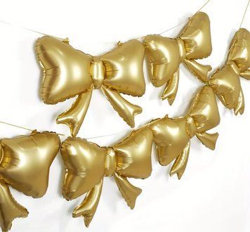 Фольгована фігура Бантик золотий 38см*34см FOIL-164 фото